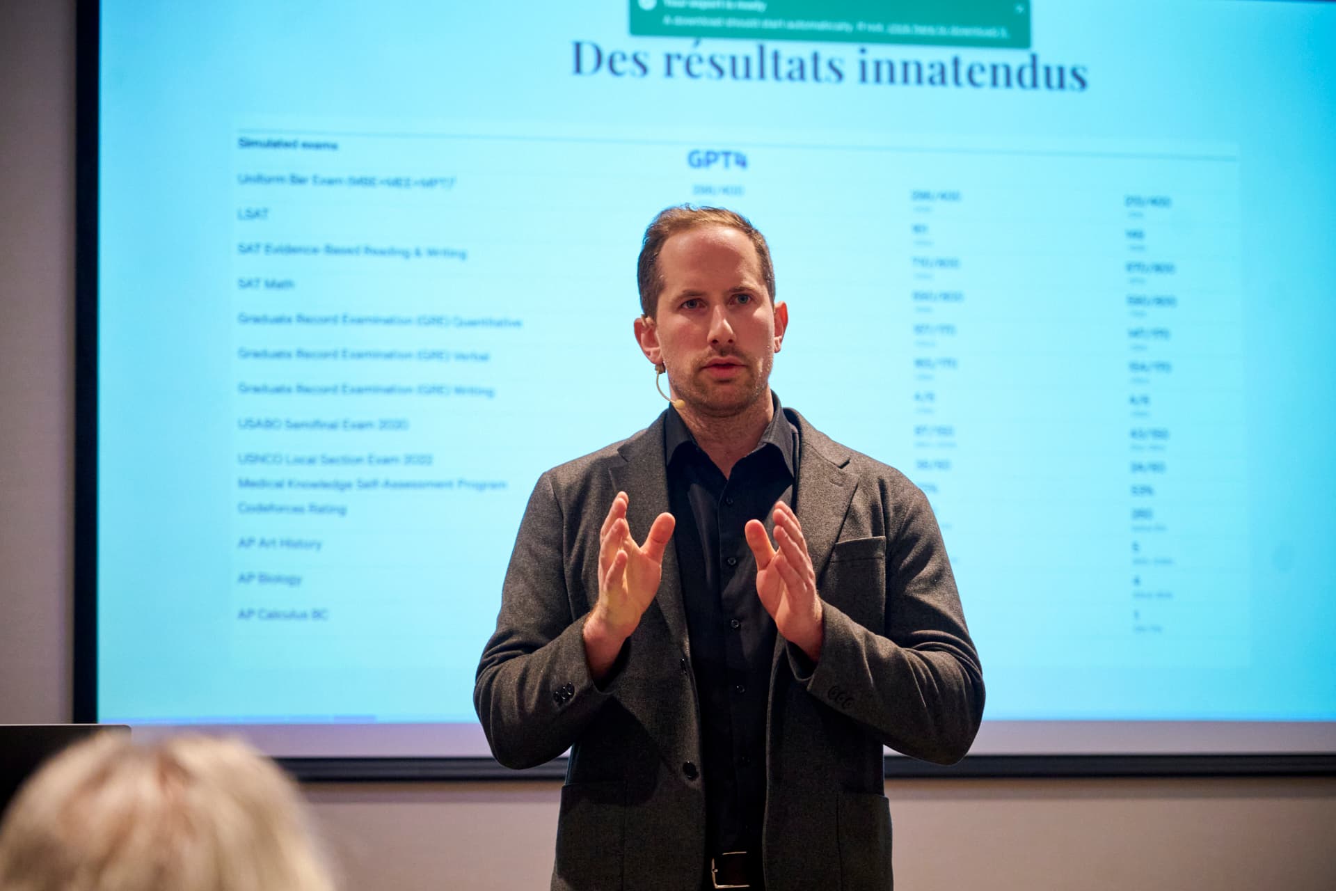 Jonathan presenting GPT-4 results at Ciné-Québec 2025